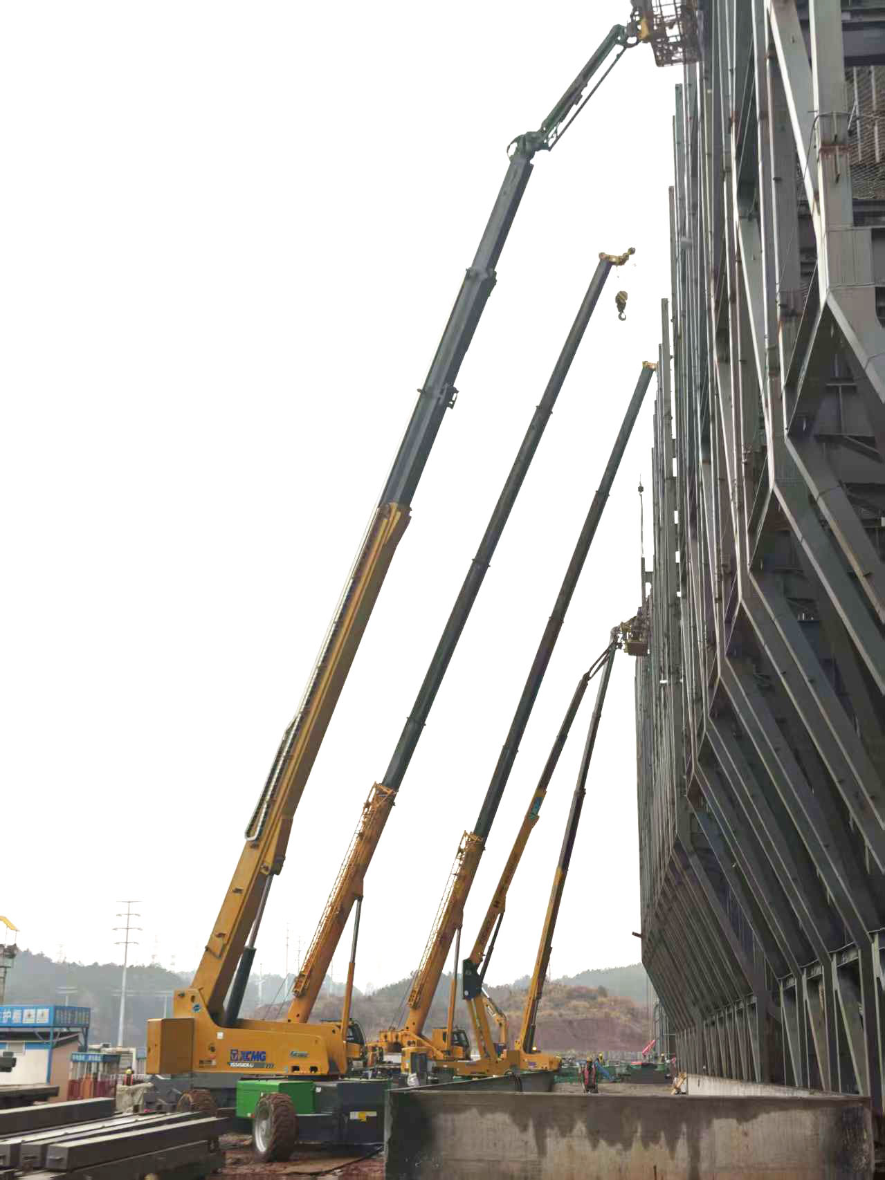 高空協(xié)同顯實(shí)力｜徐工裝備助陣銀聯(lián)黃山園區(qū)，外立面施工提質(zhì)增效